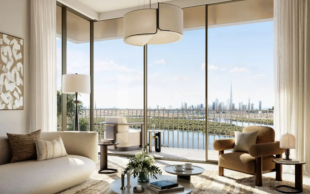 A Creek Haven living room, floor-to-ceiling glass over the mangroves and the Downtown skyline